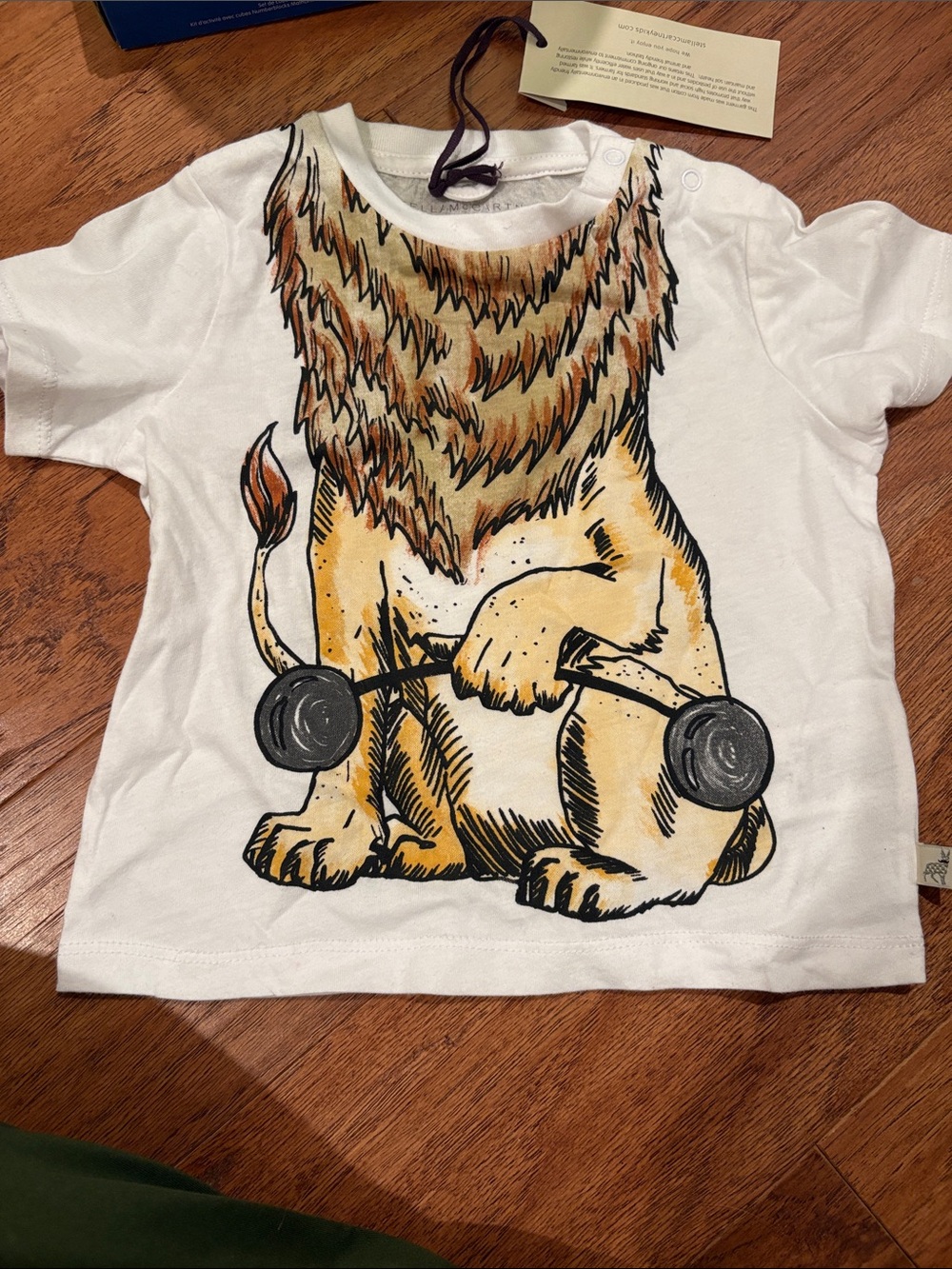Stella McCartney Kids White Tee with Lion Weightlifter Graphic